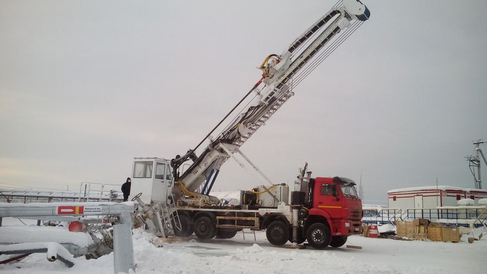 Кран-манипулятор HIAB в составе мобильной буровой установки с верхним приводом